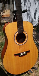 Mahogany dreadnought acoustic guitar.